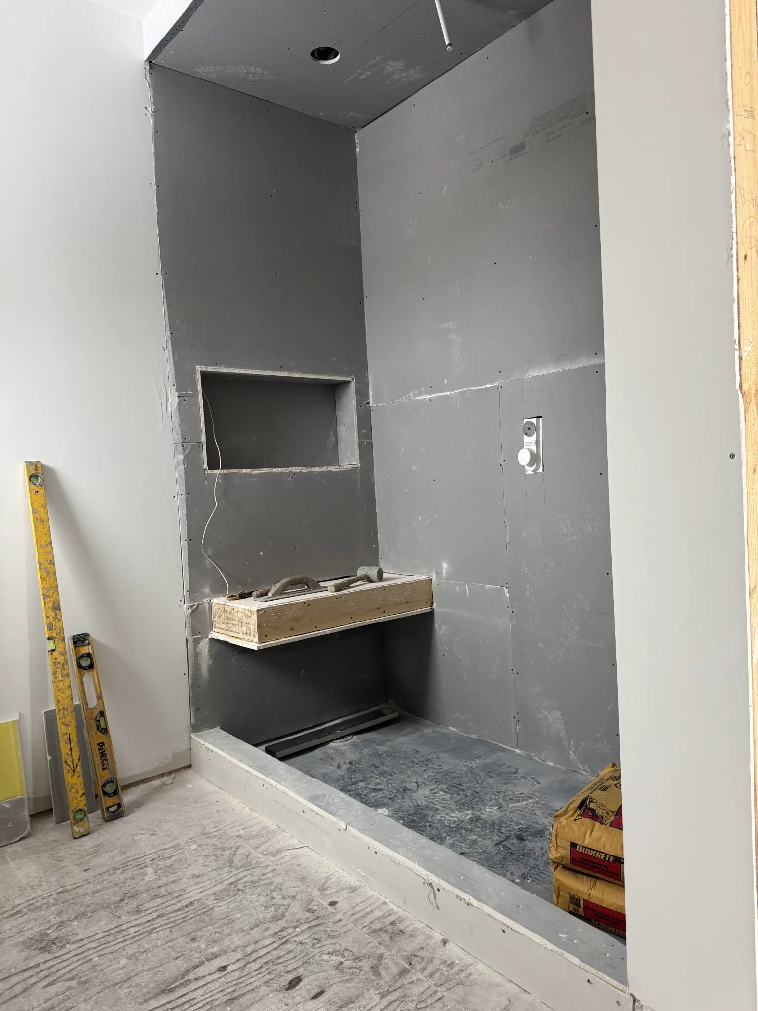 Prepared shower substrate before tile installation